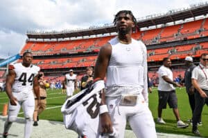 CLEVELAND, OHIO - AUGUST 23: Shedeur Sanders #12 of the Cleveland Browns walks off the field after the team's 17-16 win over the Los Angeles Rams in an NFL Preseason 2025 game at Huntington Bank Field on August 23, 2025 in Cleveland, Ohio.