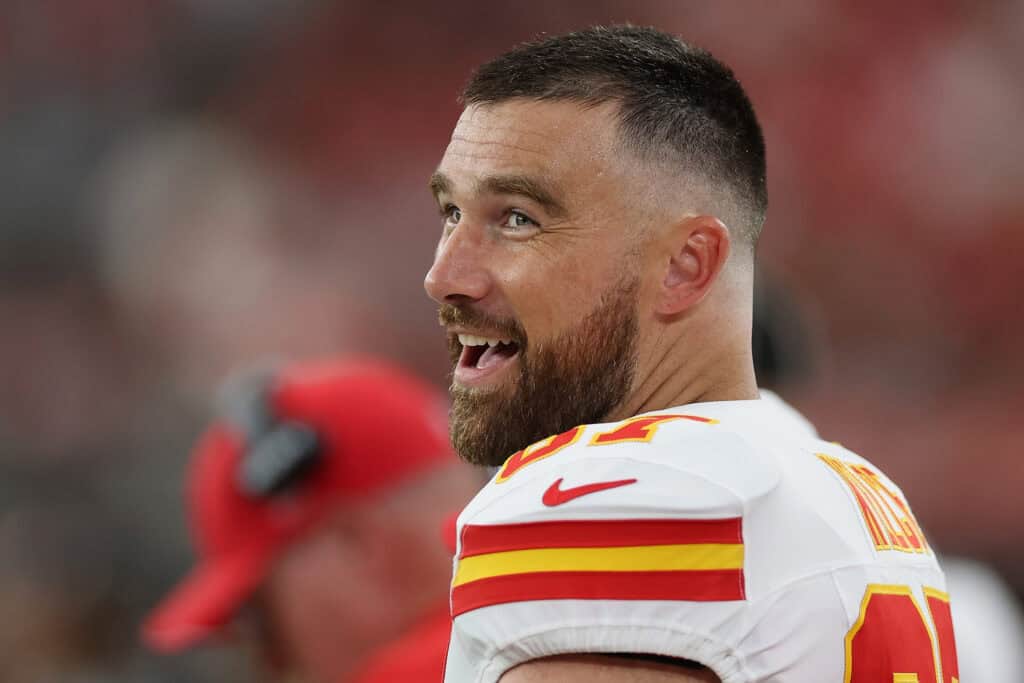 GLENDALE, ARIZONA - AUGUST 09: Tight end Travis Kelce #87 of the Kansas City Chiefs reacts on the sidelines during the first quarter of the NFL Preseason 2025 game against the Arizona Cardinals at State Farm Stadium on August 09, 2025 in Glendale, Arizona.