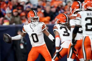 DENVER, COLORADO - DECEMBER 02: Greg Newsome II #0 of the Cleveland Browns celebrates a interception with teammates during the second quarter in the game against the Denver Broncos at Empower Field At Mile High on December 02, 2024 in Denver, Colorado.