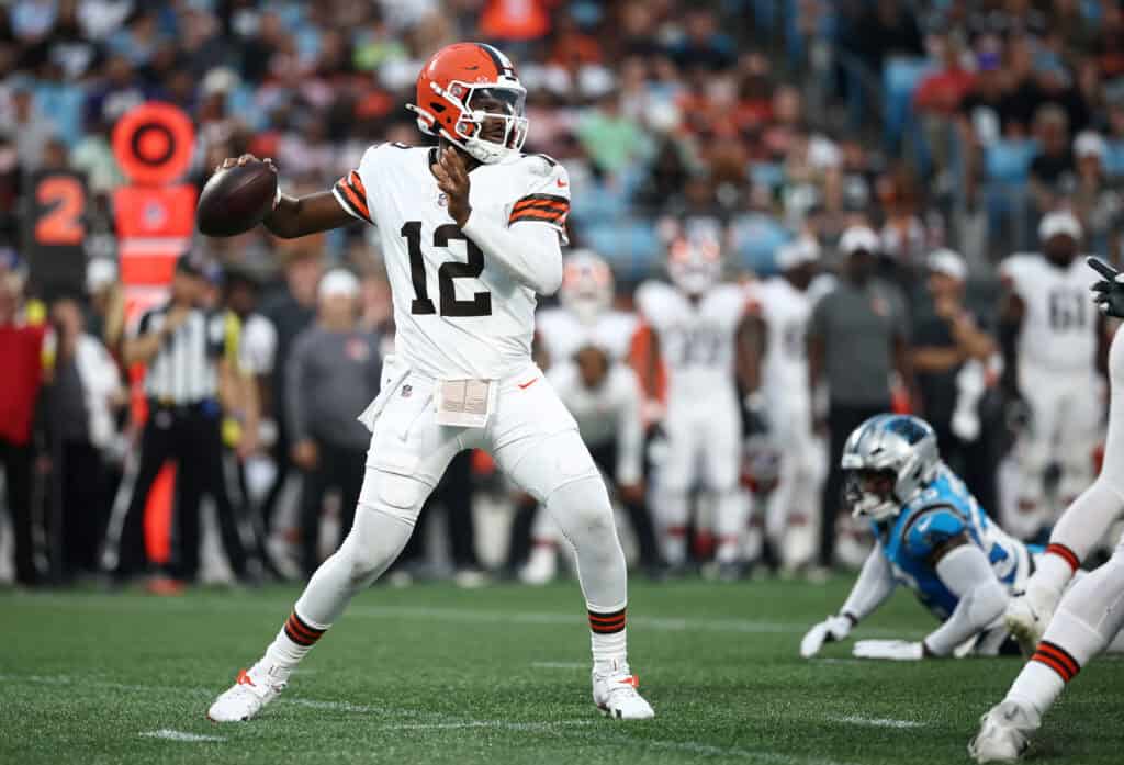 CHARLOTTE, NORTH CAROLINA - AUGUST 08: Quarterback Shedeur Sanders #12 of the Cleveland Browns drops to pass in the first half during the NFL Preseason 2025 game against the Carolina Panthers at Bank of America Stadium on August 08, 2025 in Charlotte, North Carolina.