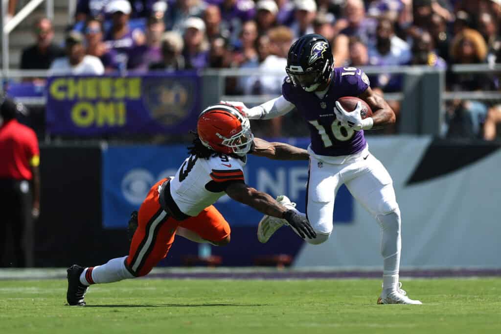 BALTIMORE, MARYLAND - SEPTEMBER 14: Tylan Wallace #16 of the Baltimore Ravens is tackled by Grant Delpit #9 of the Cleveland Browns during the game at M&T Bank Stadium on September 14, 2025 in Baltimore, Maryland.