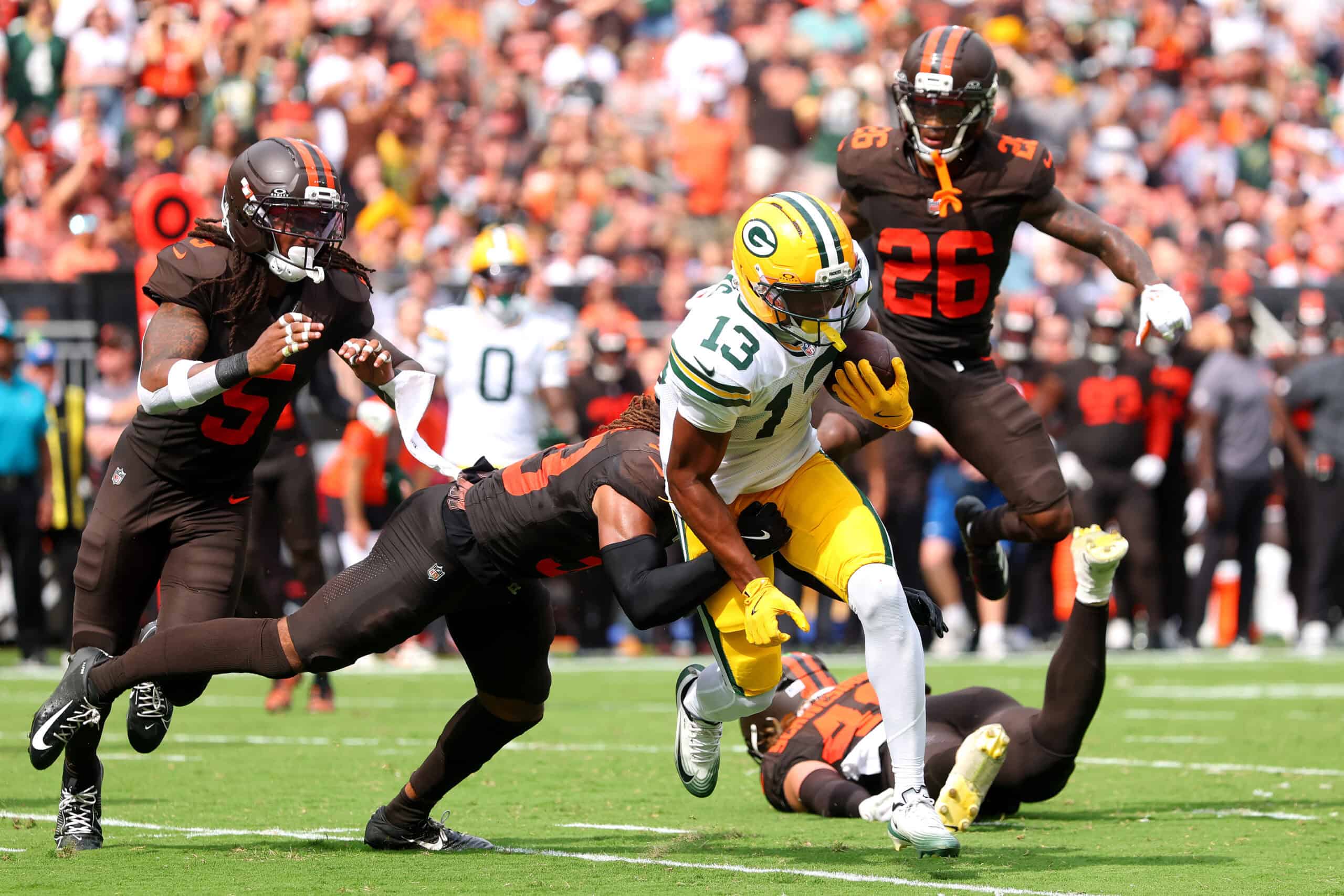 CLEVELAND, OHIO - SEPTEMBER 21: Dontayvion Wicks #13 of the Green Bay Packers runs after a catch during the third quarter against the Cleveland Browns at Huntington Bank Field on September 21, 2025 in Cleveland, Ohio.