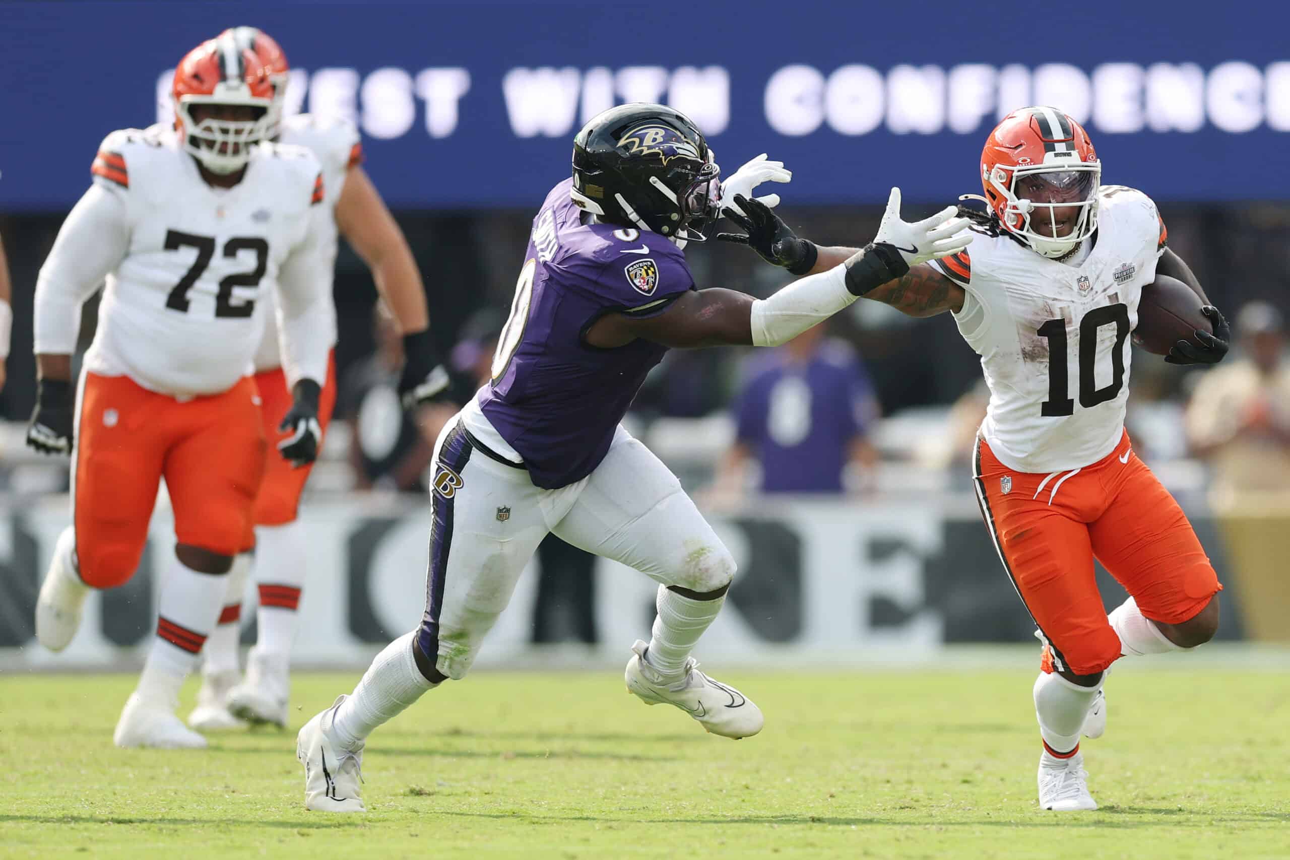 BALTIMORE, MARYLAND - SEPTEMBER 14: Quinshon Judkins #10 of the Cleveland Browns runs with the ball as Roquan Smith #0 of the Baltimore Ravens attempts a tackleduring the fourth quarter at M&T Bank Stadium on September 14, 2025 in Baltimore, Maryland.