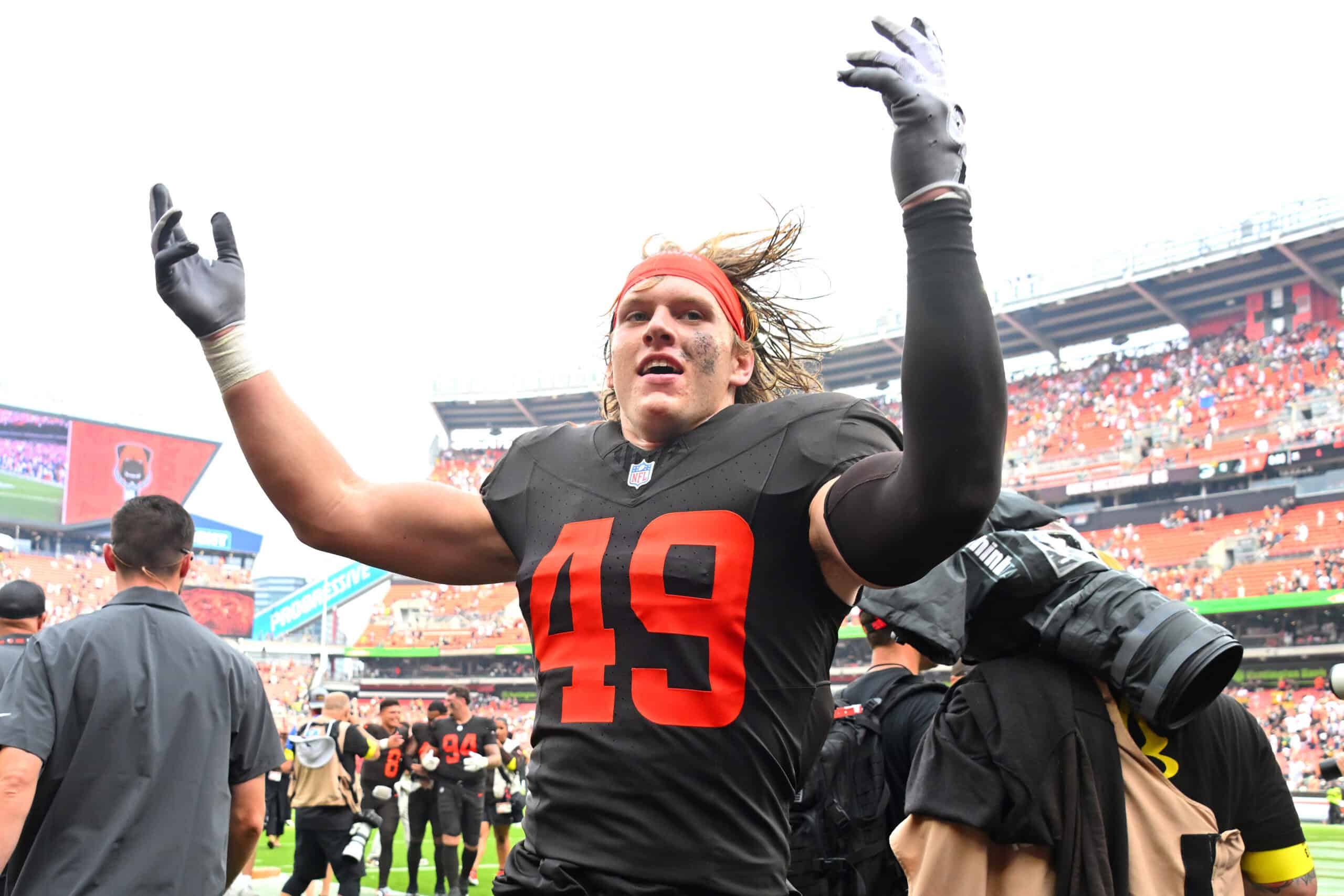CLEVELAND, OHIO - SEPTEMBER 21: Carson Schwesinger #49 of the Cleveland Browns runs off the field after defeating the Green Bay Packers 13-10 at Huntington Bank Field on September 21, 2025 in Cleveland, Ohio.