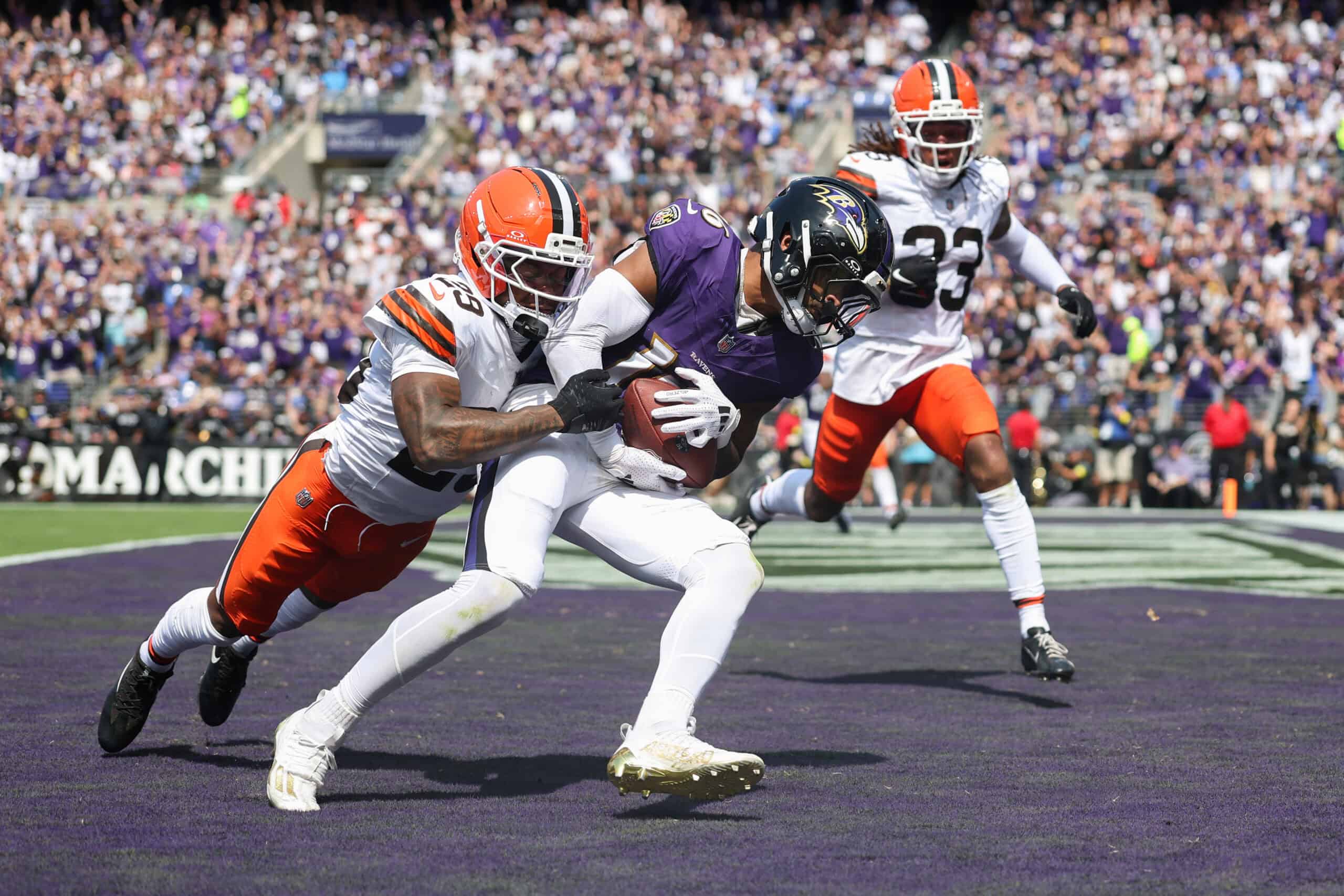BALTIMORE, MARYLAND - SEPTEMBER 14: Tylan Wallace #16 of the Baltimore Ravens scores a second quarter touchdown in front of Cameron Mitchell #29 of the Cleveland Browns at M&T Bank Stadium on September 14, 2025 in Baltimore, Maryland.