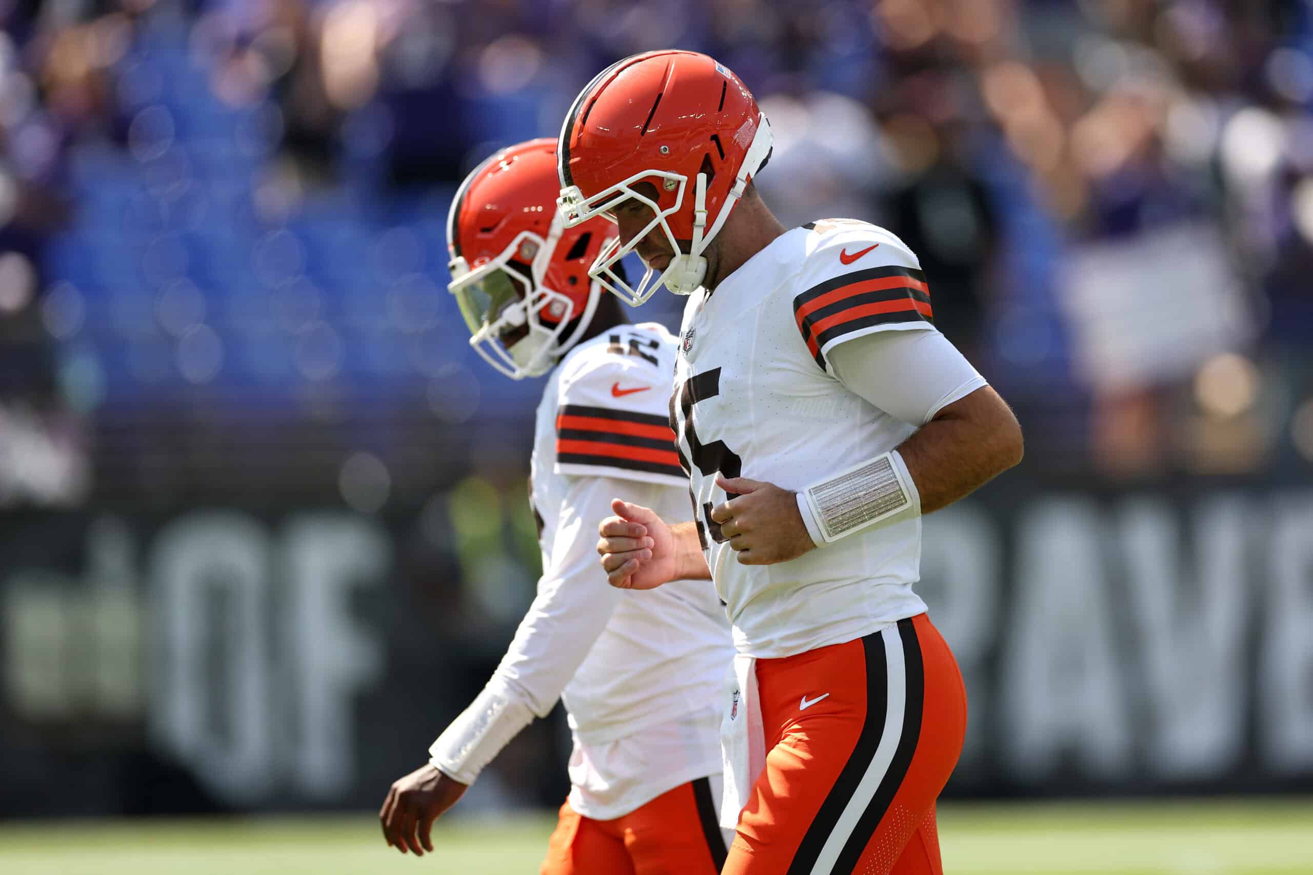 BALTIMORE, MARYLAND - SEPTEMBER 14: Quarterbacks Joe Flacco #15 and Shedeur Sanders #12 of the Cleveland Browns warm up against the Baltimore Ravens at M&T Bank Stadium on September 14, 2025 in Baltimore, Maryland.