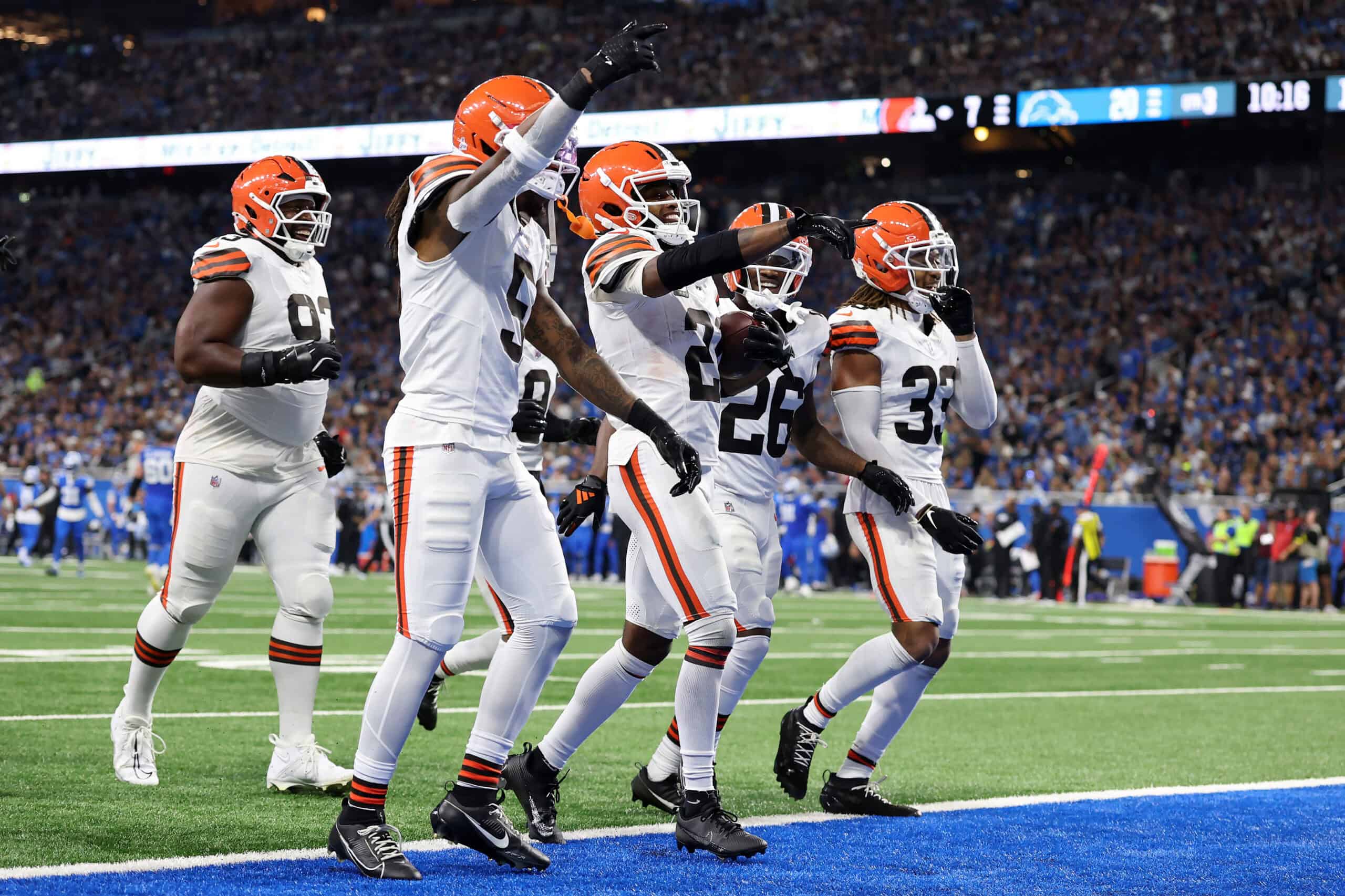 DETROIT, MICHIGAN - SEPTEMBER 28: Denzel Ward #21 of the Cleveland Browns celebrates an interception with teammates during the third quarter against the Detroit Lions at Ford Field on September 28, 2025 in Detroit, Michigan.