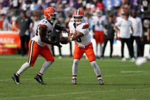 BALTIMORE, MARYLAND - SEPTEMBER 14: Quarterback Dillon Gabriel #8 of the Cleveland Browns hands the ball off to running back Jerome Ford #34 against the Baltimore Ravens at M&T Bank Stadium on September 14, 2025 in Baltimore, Maryland.