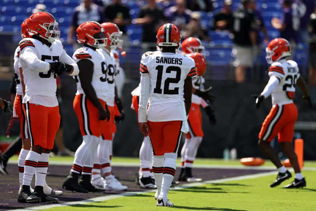 BALTIMORE, MARYLAND - SEPTEMBER 14: Quarterback Shedeur Sanders #12 of the Cleveland Browns looks on during the Browns and Baltimore Ravens game at M&T Bank Stadium on September 14, 2025 in Baltimore, Maryland.