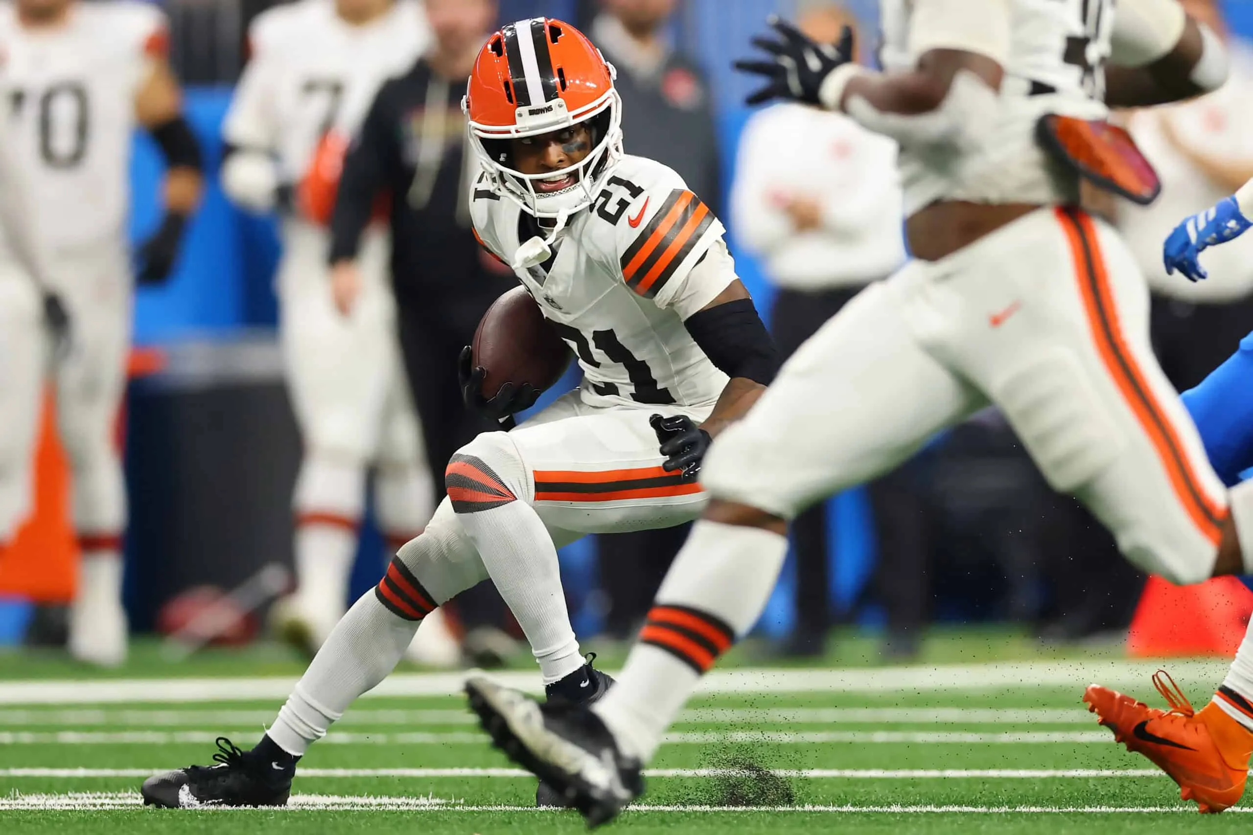 DETROIT, MICHIGAN - SEPTEMBER 28: Denzel Ward #21 of the Cleveland Browns runs the ball during the third quarter against the Detroit Lions at Ford Field on September 28, 2025 in Detroit, Michigan.