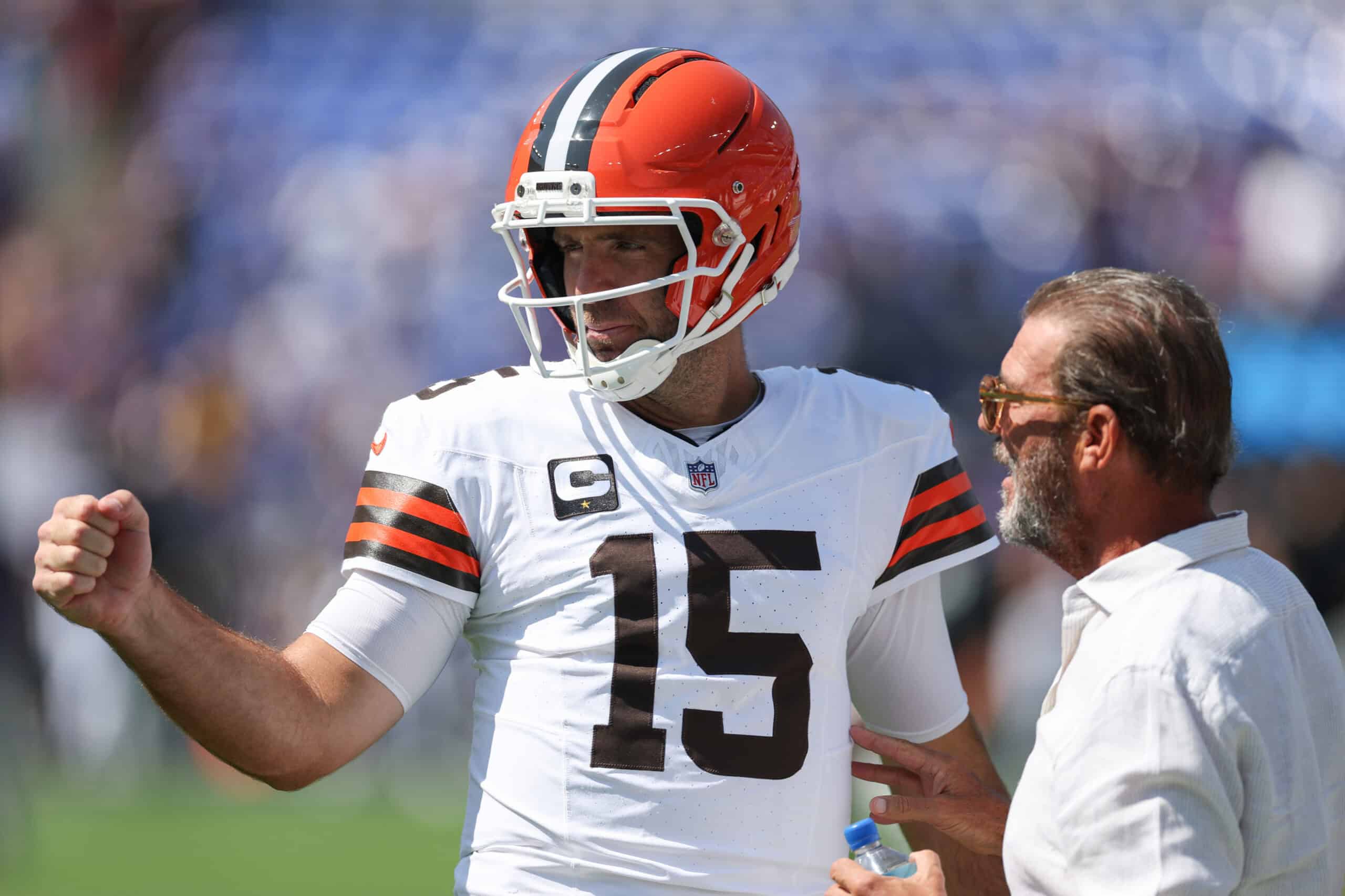 BALTIMORE, MARYLAND - SEPTEMBER 14: Joe Flacco #15 of the Cleveland Browns talks with Baltimore Ravens owner Stephen Bisciotti prior to a game at M&T Bank Stadium on September 14, 2025 in Baltimore, Maryland.