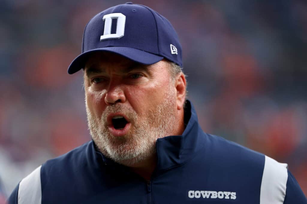 DENVER, CO - AUGUST 13: Head Coach Mike McCarthy of the Dallas Cowboys talks with his team against the Denver Broncos during a preseason game at Empower Field At Mile High on August 13, 2022 in Denver, Colorado.