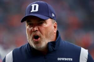 DENVER, CO - AUGUST 13: Head Coach Mike McCarthy of the Dallas Cowboys talks with his team against the Denver Broncos during a preseason game at Empower Field At Mile High on August 13, 2022 in Denver, Colorado.