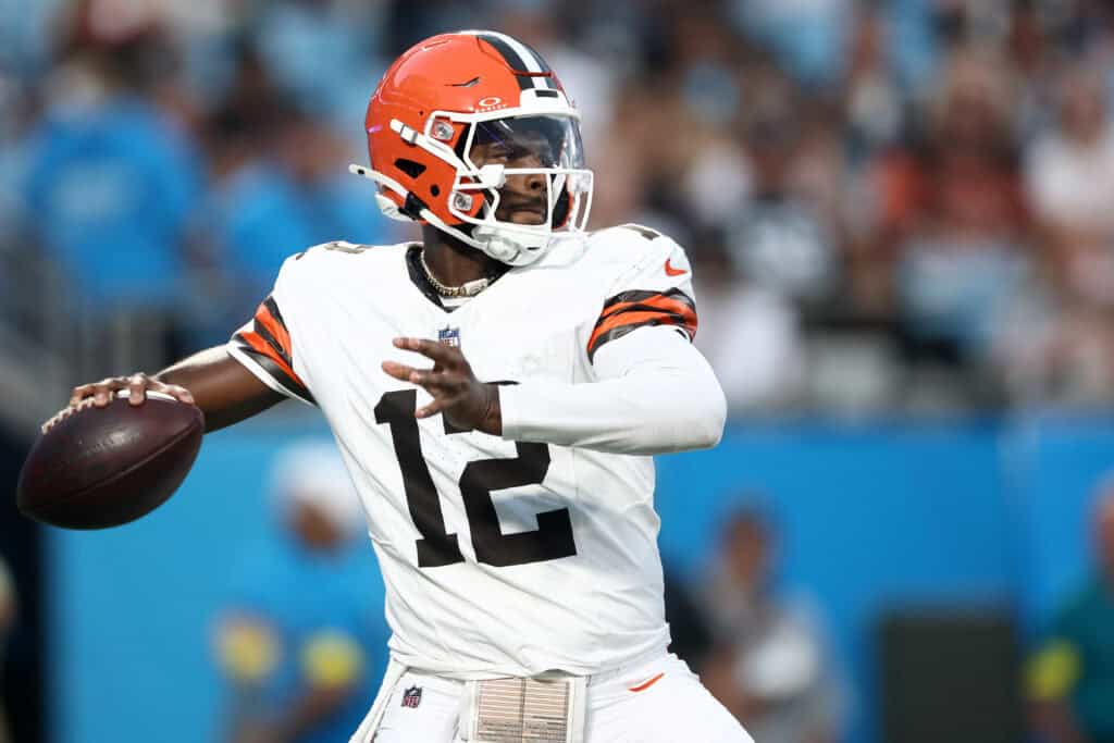 CHARLOTTE, NORTH CAROLINA - AUGUST 08: Quarterback Shedeur Sanders #12 of the Cleveland Browns drops to pass in the first half during the NFL Preseason 2025 game against the Carolina Panthers at Bank of America Stadium on August 08, 2025 in Charlotte, North Carolina.