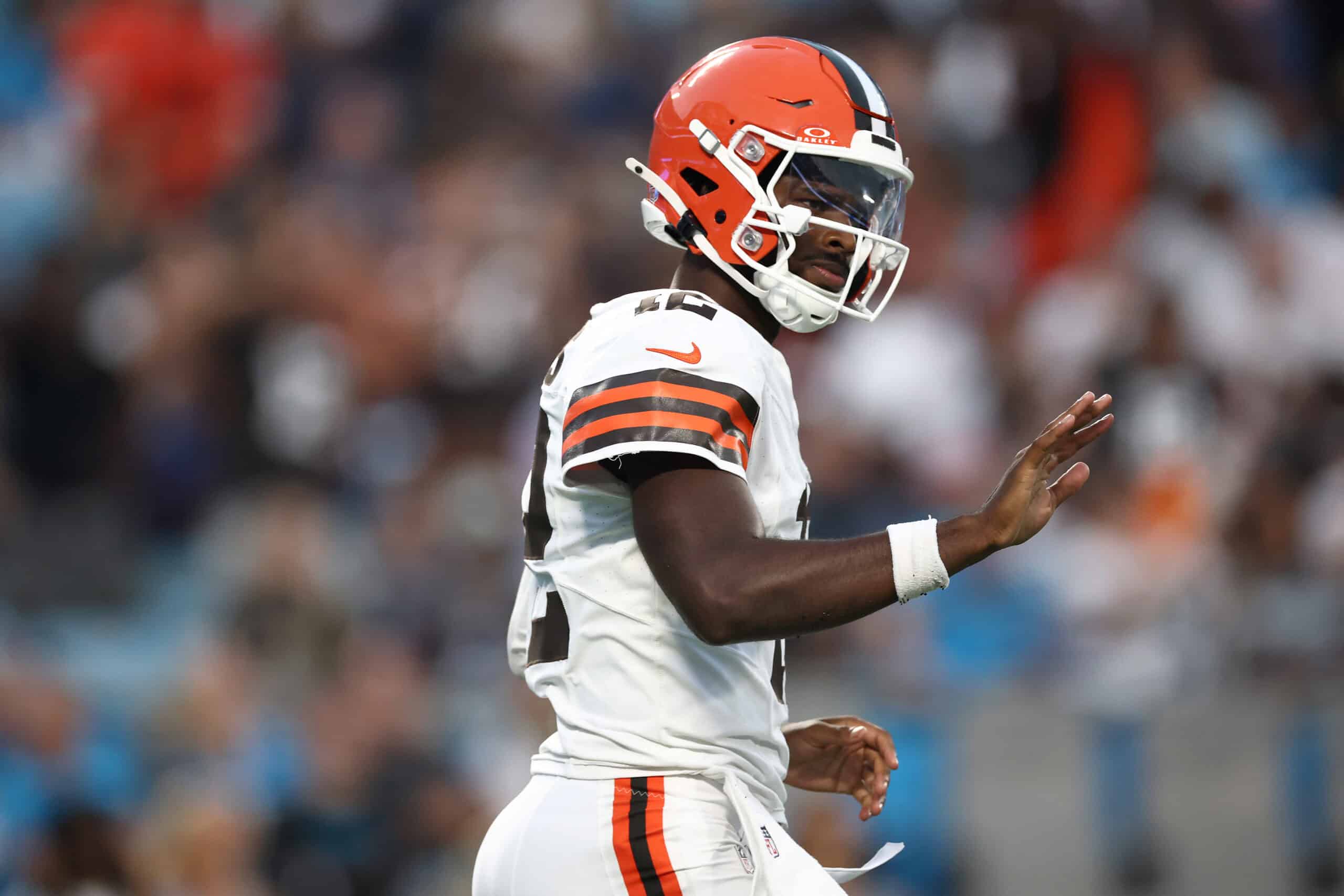CHARLOTTE, NORTH CAROLINA - AUGUST 08: Quarterback Shedeur Sanders #12 of the Cleveland Browns reacts following a completion in the first half during the NFL Preseason 2025 game against the Carolina Panthers at Bank of America Stadium on August 08, 2025 in Charlotte, North Carolina.