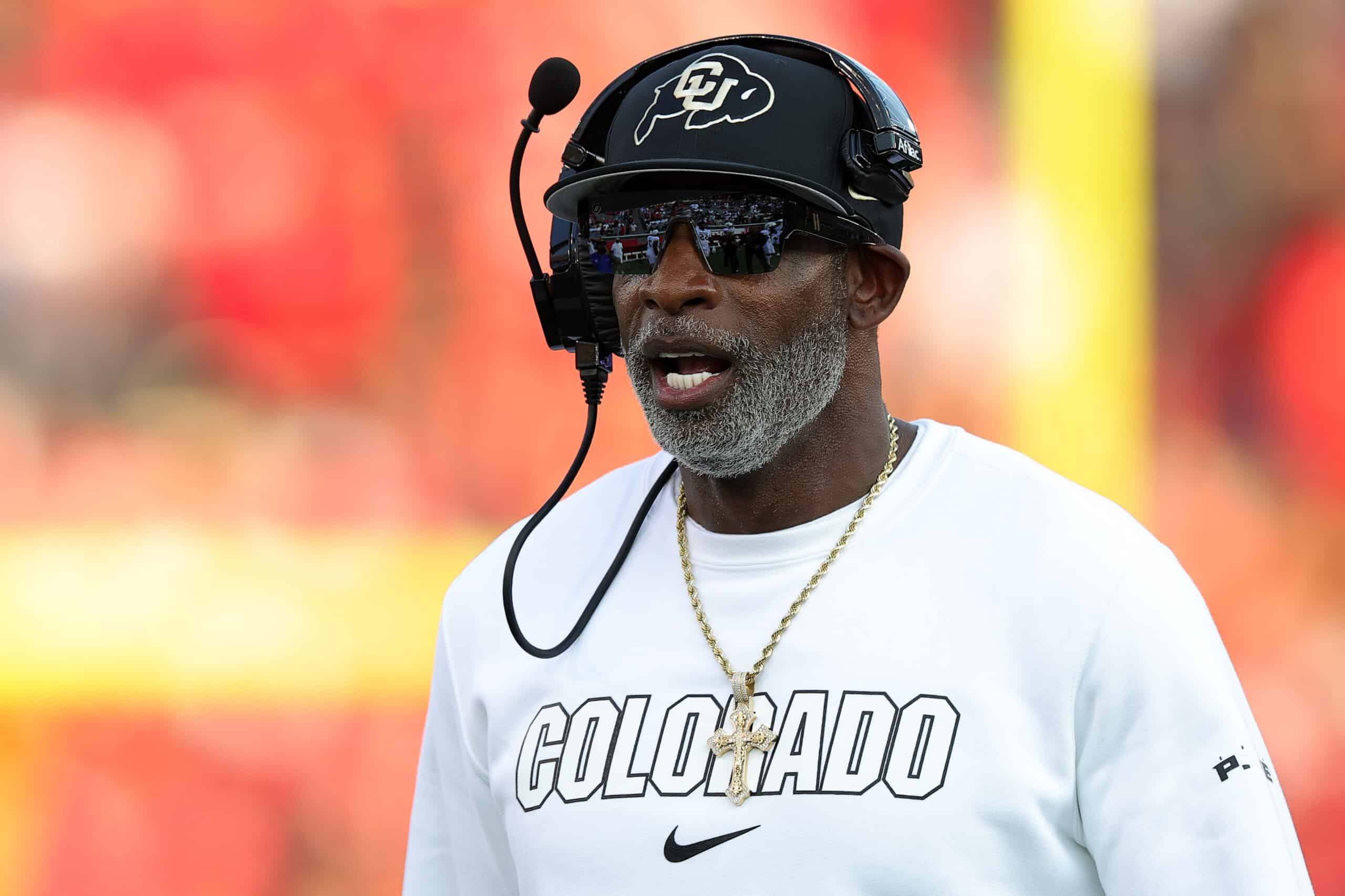 HOUSTON, TEXAS - SEPTEMBER 12: Head coach Deion Sanders of the Colorado Buffaloes instructs the team during the first half against the Houston Cougars at TDECU Stadium on September 12, 2025 in Houston, Texas.