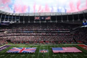 LONDON, ENGLAND - OCTOBER 05: Flags of the United Kingdom and United States of America are displayed during the national anthems prior to the NFL 2025 game between Minnesota Vikings and Cleveland Browns at Tottenham Hotspur Stadium on October 05, 2025 in London, England.""