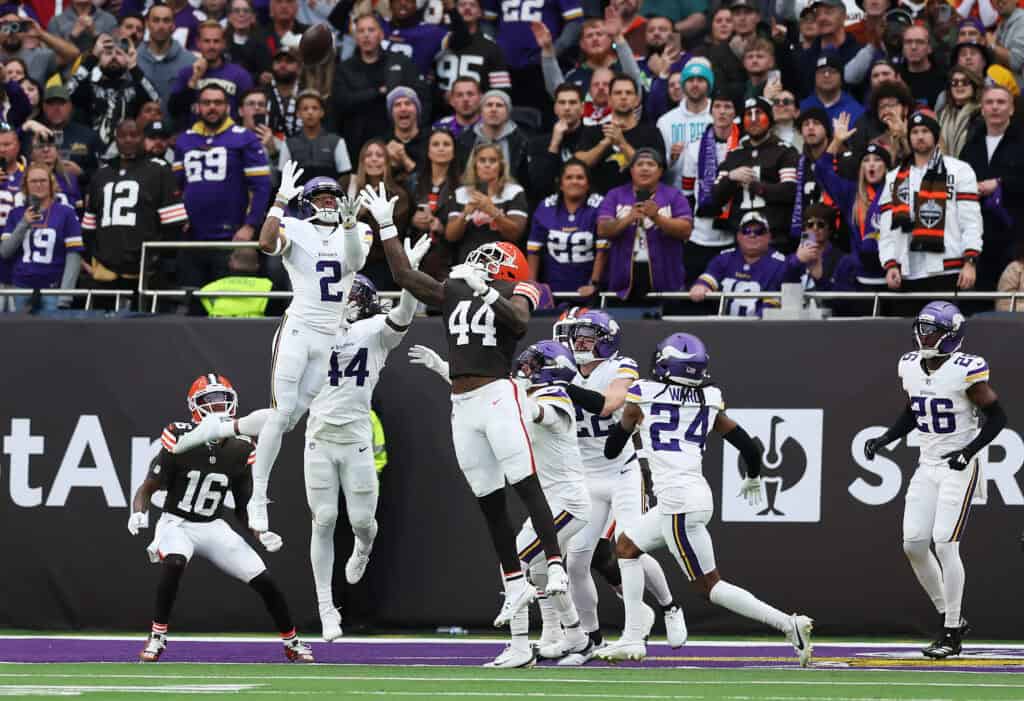 LONDON, ENGLAND - OCTOBER 05: Isaiah Rodgers of Minnesota Vikings and Harold Fannin Jr. of Cleveland Browns contest for ball thrown by Dillon Gabriel of Cleveland Browns (not pictured) during the fourth quarter in the NFL 2025 game between Minnesota Vikings and Cleveland Browns at Tottenham Hotspur Stadium on October 05, 2025 in London, England.""