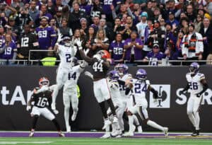 LONDON, ENGLAND - OCTOBER 05: Isaiah Rodgers of Minnesota Vikings and Harold Fannin Jr. of Cleveland Browns contest for ball thrown by Dillon Gabriel of Cleveland Browns (not pictured) during the fourth quarter in the NFL 2025 game between Minnesota Vikings and Cleveland Browns at Tottenham Hotspur Stadium on October 05, 2025 in London, England.""