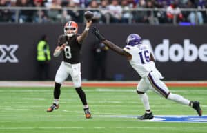 LONDON, ENGLAND - OCTOBER 05: Dillon Gabriel of Cleveland Browns throws a pass under pressure from Dallas Turner of Minnesota Vikings during the fourth quarter in the NFL 2025 game between Minnesota Vikings and Cleveland Browns at Tottenham Hotspur Stadium on October 05, 2025 in London, England.""