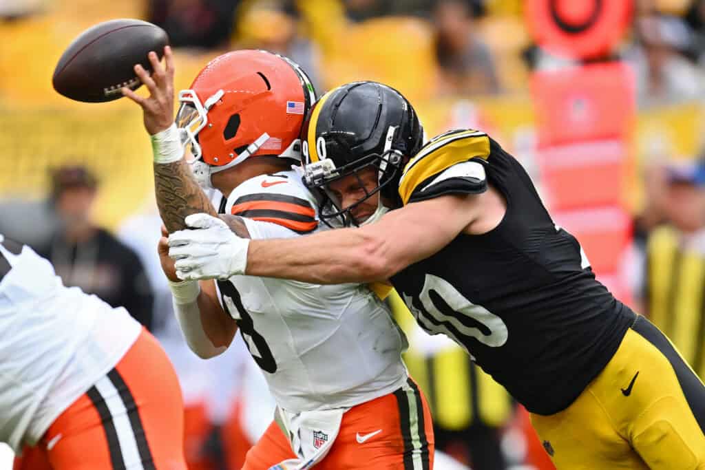 PITTSBURGH, PENNSYLVANIA - OCTOBER 12: T.J. Watt #90 of the Pittsburgh Steelers hits Dillon Gabriel #8 of the Cleveland Browns during the third quarter in the game at Acrisure Stadium on October 12, 2025 in Pittsburgh, Pennsylvania.