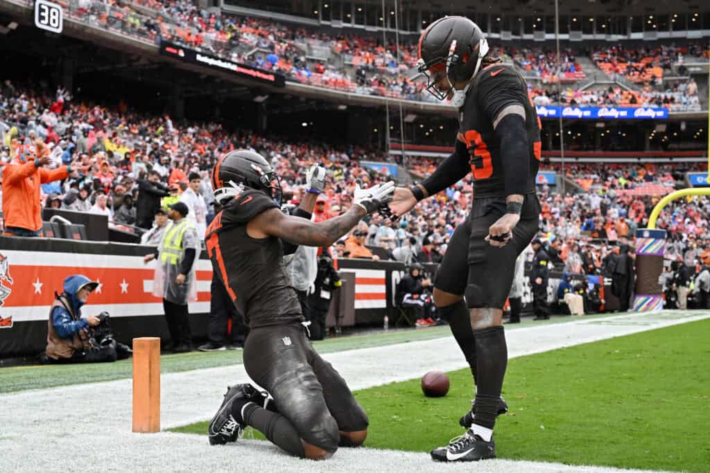 CLEVELAND, OHIO - OCTOBER 19: Tyson Campbell #7 and Ronnie Hickman Jr. #33 of the Cleveland Browns celebrate after a pass breakup against the Miami Dolphins during the second quarter at Huntington Bank Field on October 19, 2025 in Cleveland, Ohio.