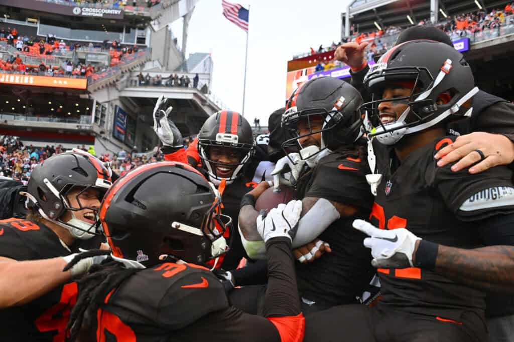 CLEVELAND, OHIO - OCTOBER 19: The Cleveland Browns defense celebrate after an interception in the game against the Miami Dolphins at Huntington Bank Field on October 19, 2025 in Cleveland, Ohio.