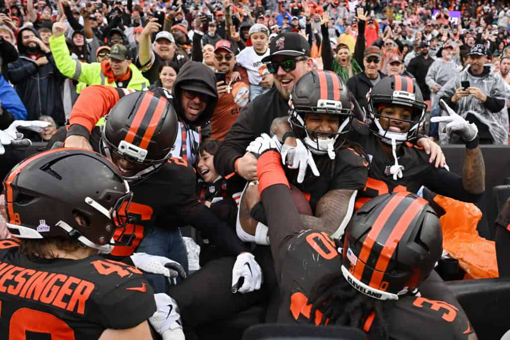 CLEVELAND, OHIO - OCTOBER 19: Rayshawn Jenkins #5 of the Cleveland Browns celebrates with teammates after an interception against the Miami Dolphins during the fourth quarter at Huntington Bank Field on October 19, 2025 in Cleveland, Ohio.