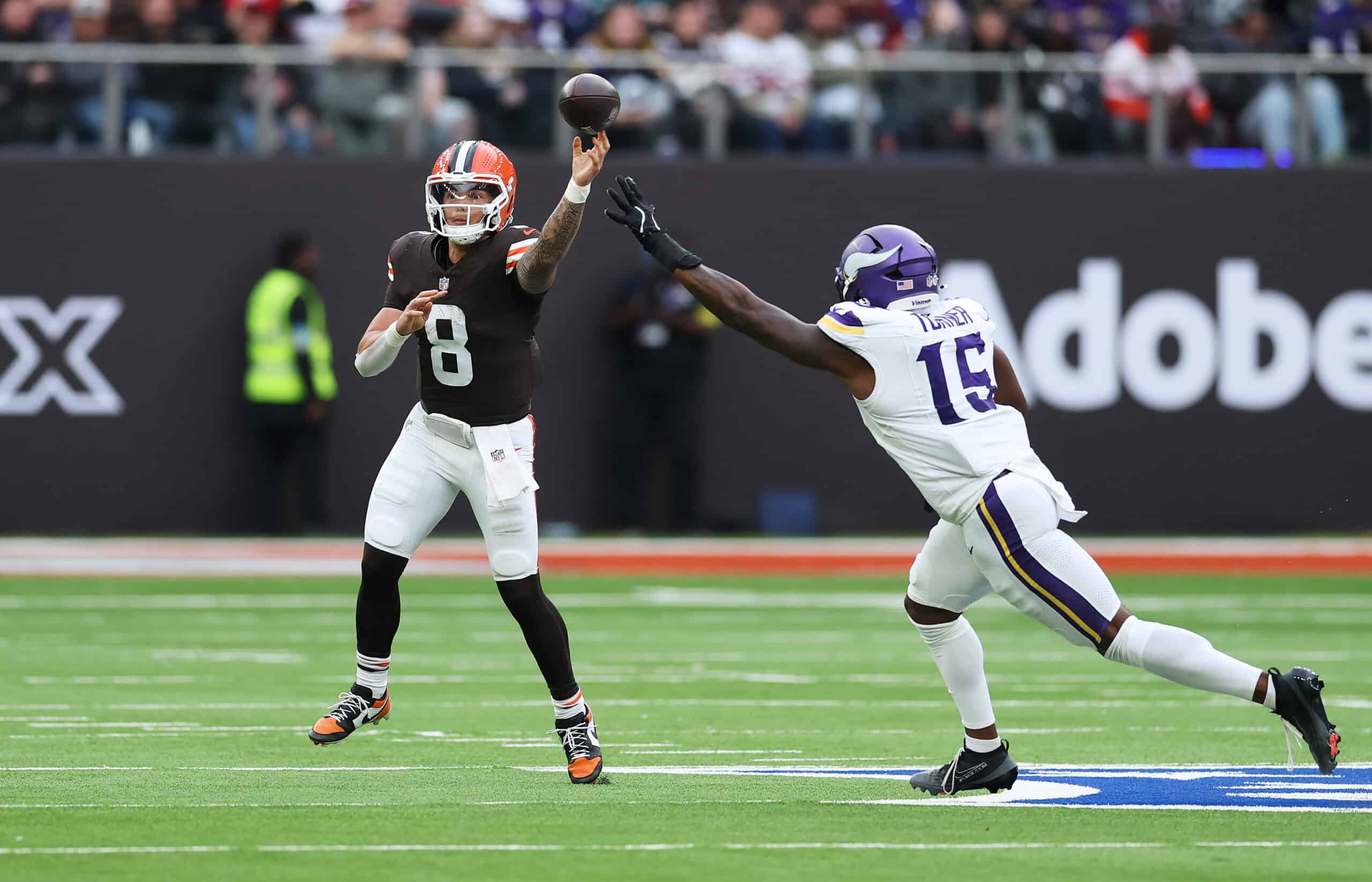 LONDON, ENGLAND - OCTOBER 05: Dillon Gabriel of Cleveland Browns throws a pass under pressure from Dallas Turner of Minnesota Vikings during the fourth quarter in the NFL 2025 game between Minnesota Vikings and Cleveland Browns at Tottenham Hotspur Stadium on October 05, 2025 in London, England.""