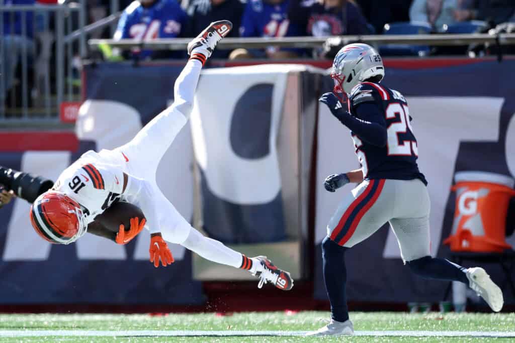 FOXBOROUGH, MASSACHUSETTS - OCTOBER 26: Isaiah Bond #16 of the Cleveland Browns makes a reception defended by Marcus Jones #25 of the New England Patriots during the second quarter in the game at Gillette Stadium on October 26, 2025 in Foxborough, Massachusetts.
