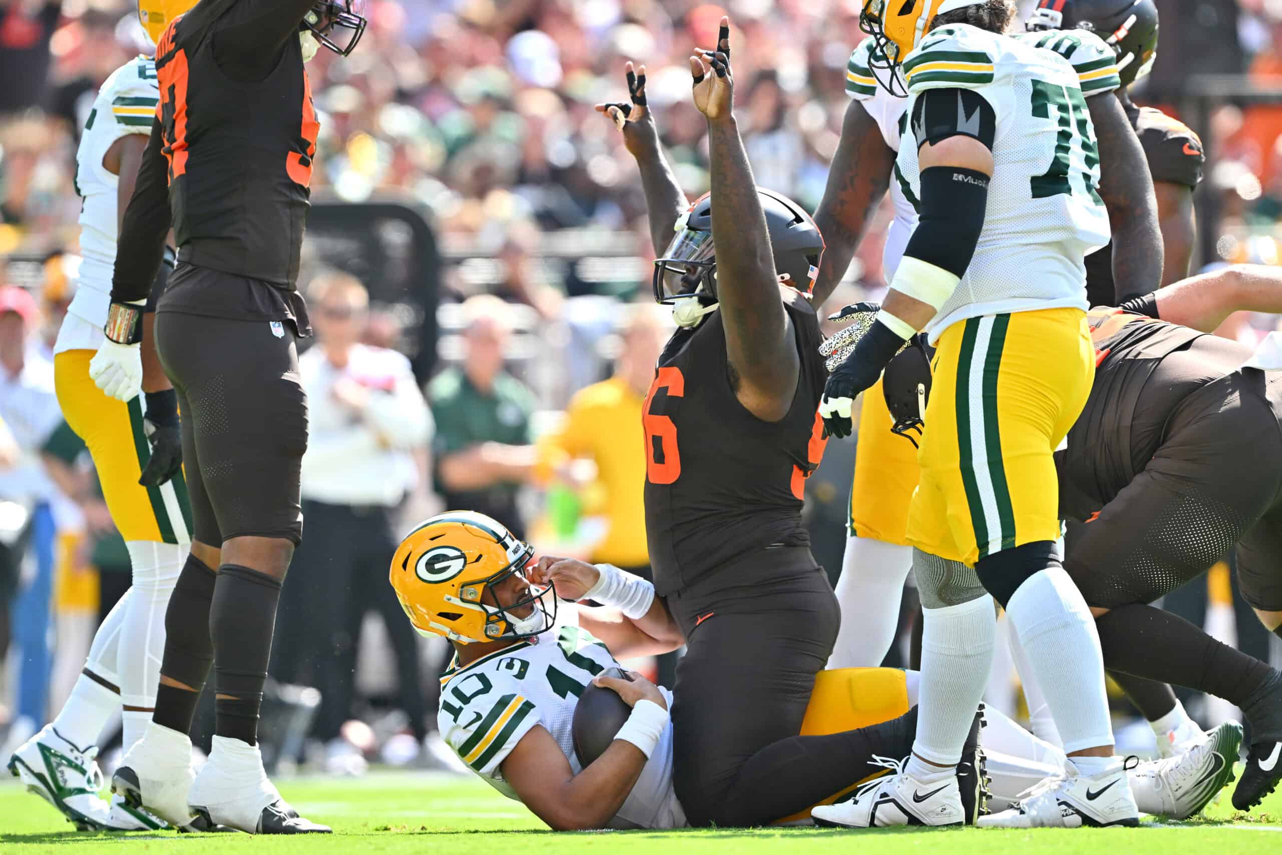 CLEVELAND, OHIO - SEPTEMBER 21: Maliek Collins #96 of the Cleveland Browns celebrates after Jordan Love #10 of the Green Bay Packers is sacked during the first quarter at Huntington Bank Field on September 21, 2025 in Cleveland, Ohio.