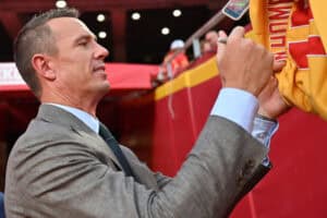 KANSAS CITY, MISSOURI - SEPTEMBER 28: Former NFL player Matt Ryan signs autographs following a game between the Baltimore Ravens and Kansas City Chiefs at Arrowhead Stadium on September 28, 2025 in Kansas City, Missouri.