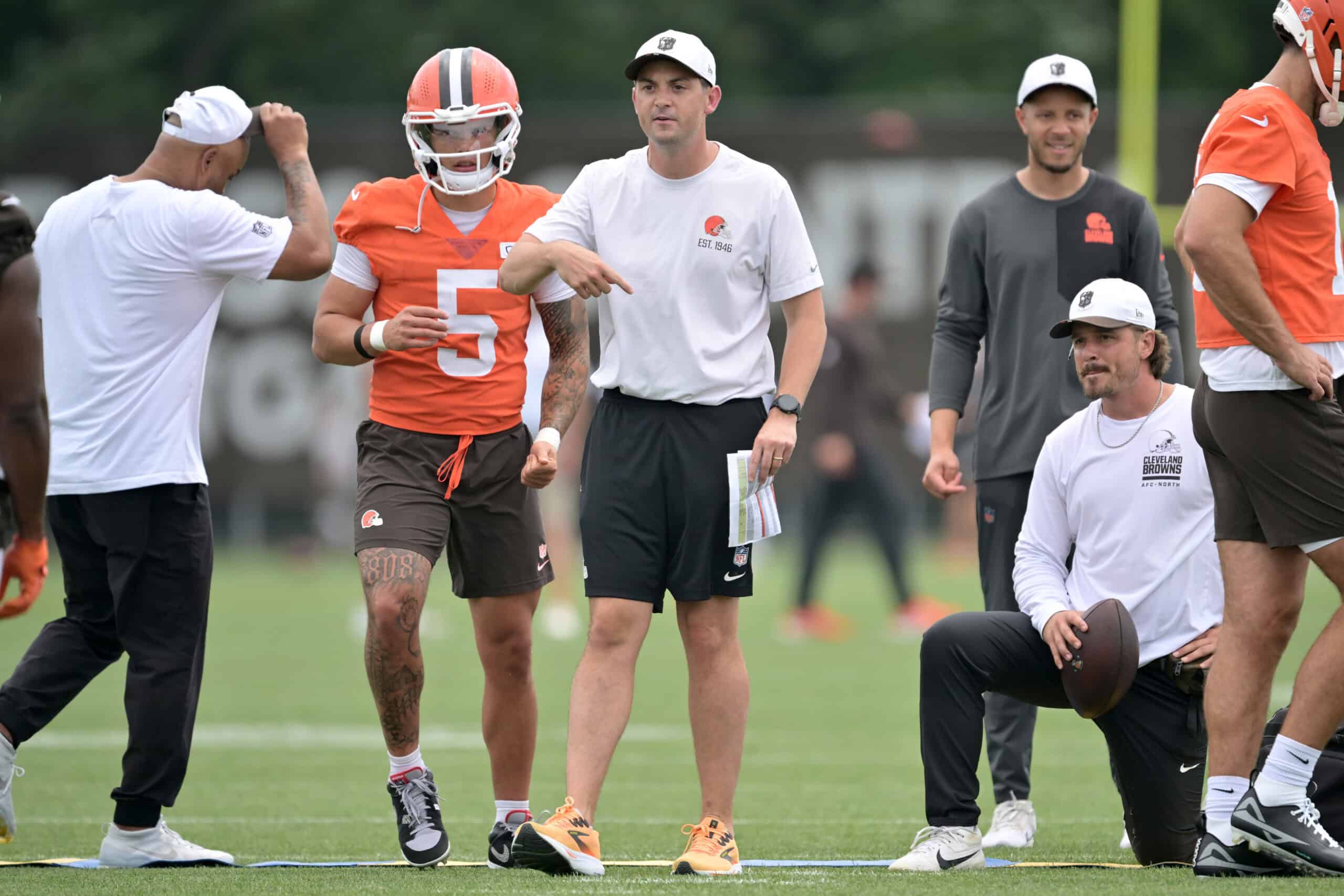 BEREA, OHIO - JULY 25: Offensive coordinator Tommy Rees works with quarterback Dillon Gabriel #5 of the Cleveland Browns during training camp at CrossCountry Mortgage Campus on July 25, 2025 in Berea, Ohio.