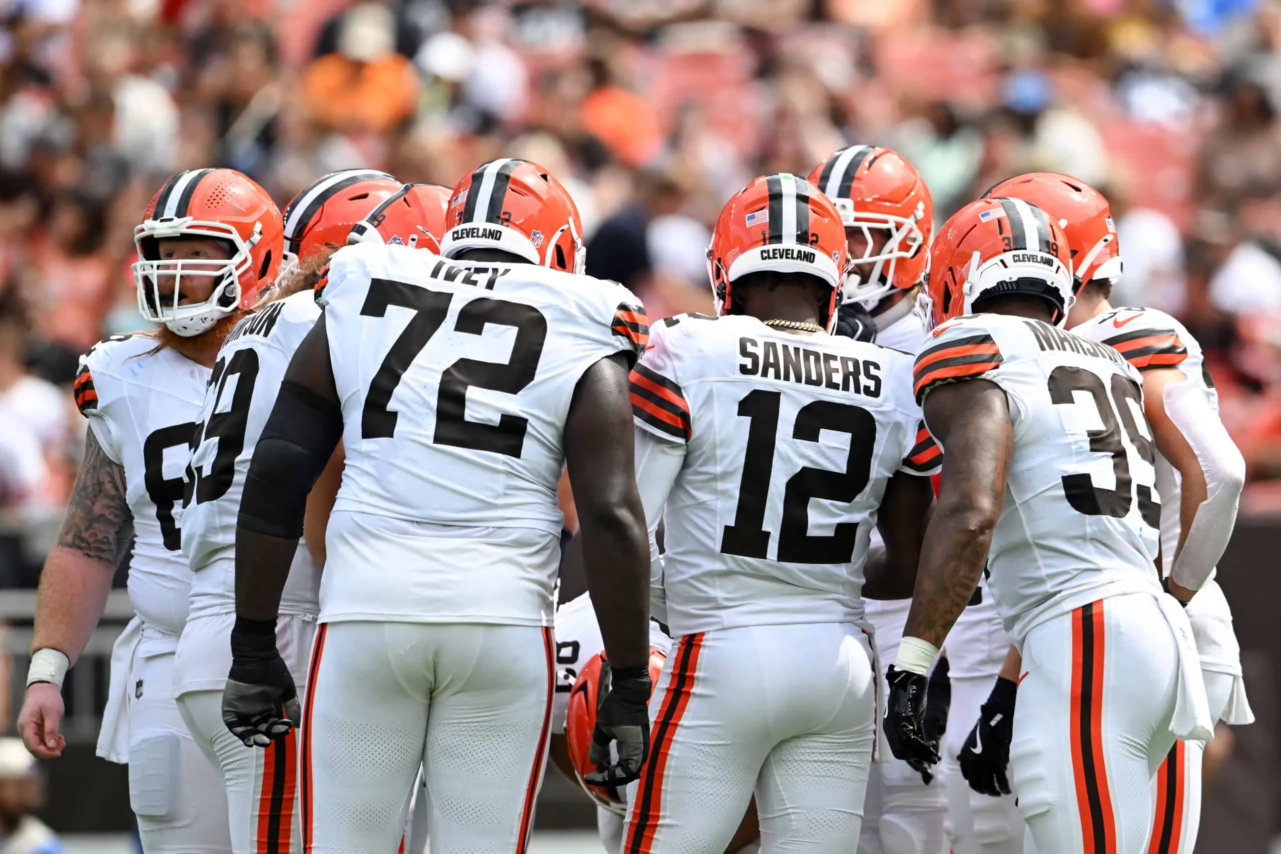 CLEVELAND, OHIO - AUGUST 23: Shedeur Sanders #12 of the Cleveland Browns delivers a play call to the offense during the third quarter of an NFL Preseason 2025 game against the Los Angeles Rams at Huntington Bank Field on August 23, 2025 in Cleveland, Ohio.