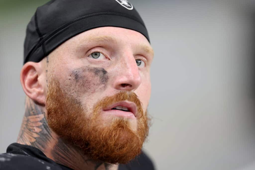 LAS VEGAS, NEVADA - OCTOBER 12: Maxx Crosby #98 of the Las Vegas Raiders looks on during the fourth quarter in the game against the Tennessee Titans at Allegiant Stadium on October 12, 2025 in Las Vegas, Nevada.