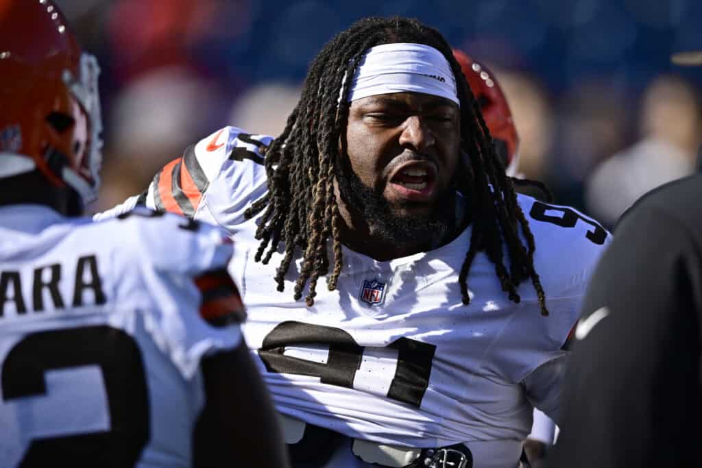 FOXBOROUGH, MASSACHUSETTS - OCTOBER 26: Alex Wright #91 of the Cleveland Browns looks on during warmups the game against the New England Patriots at Gillette Stadium on October 26, 2025 in Foxborough, Massachusetts.