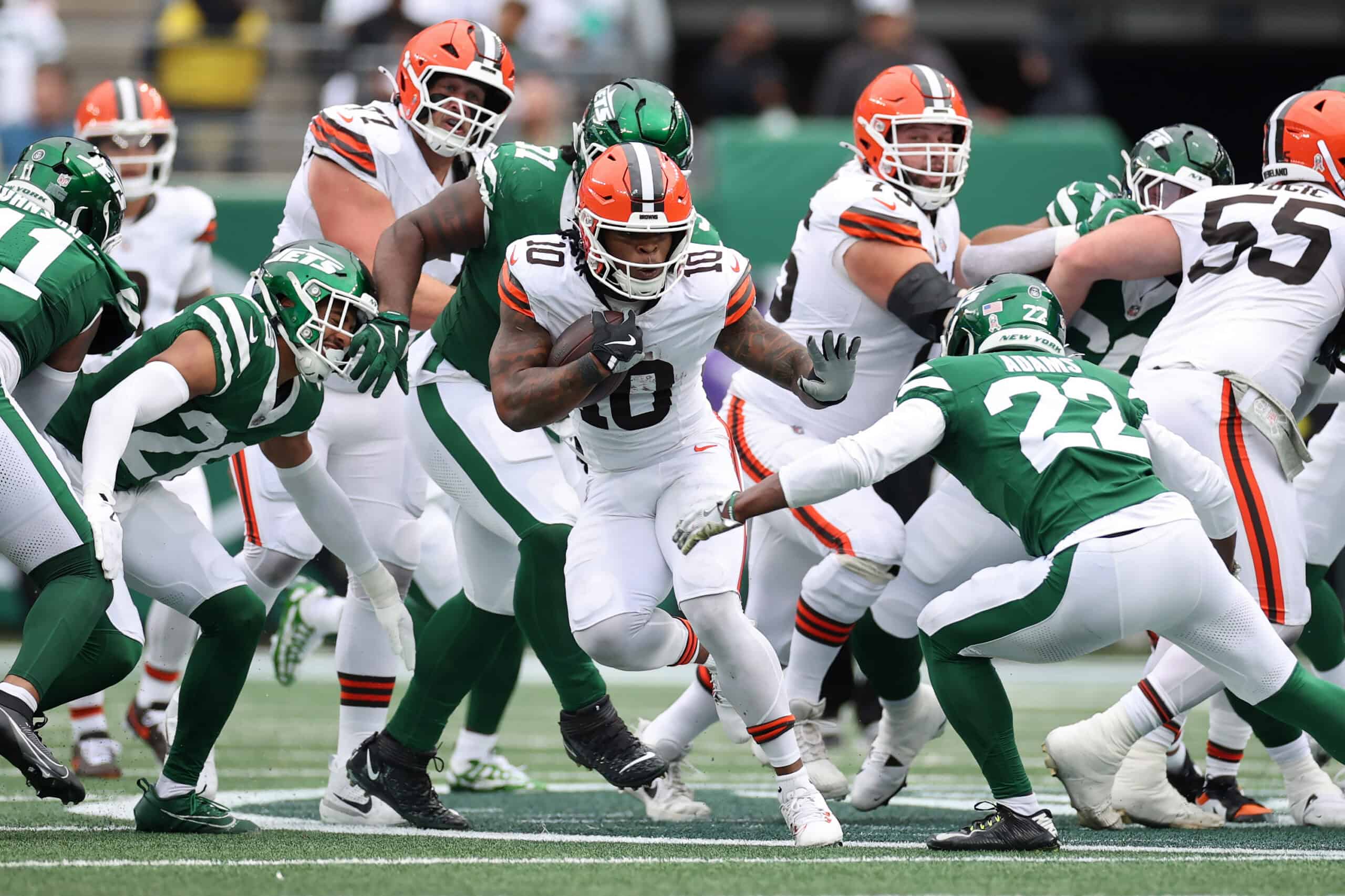 EAST RUTHERFORD, NEW JERSEY - NOVEMBER 09: Quinshon Judkins #10 of the Cleveland Browns carries the ball against Tony Adams #22 of the New York Jets during the first half in the game at MetLife Stadium on November 09, 2025 in East Rutherford, New Jersey.