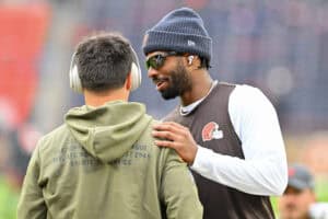 CLEVELAND, OHIO - NOVEMBER 16: Dillon Gabriel #8 and Shedeur Sanders #12 of the Cleveland Browns speak during warmups before the game against the Baltimore Ravens at Huntington Bank Field on November 16, 2025 in Cleveland, Ohio.