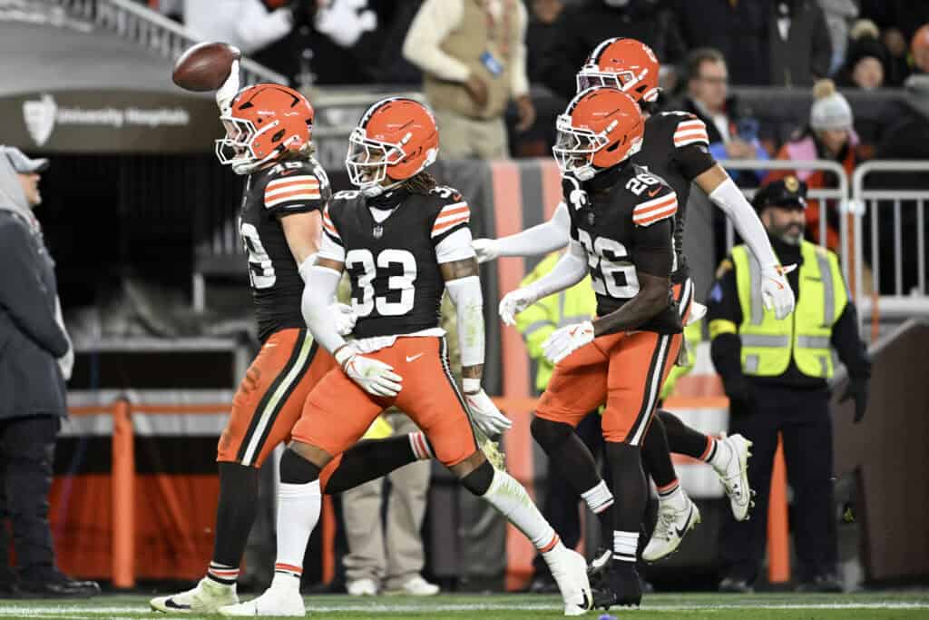 CLEVELAND, OHIO - NOVEMBER 16: Carson Schwesinger #49 of the Cleveland Browns celebrates after an interception against the Baltimore Ravens with teammates during the third quarter at Huntington Bank Field on November 16, 2025 in Cleveland, Ohio.