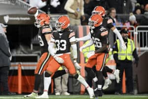 CLEVELAND, OHIO - NOVEMBER 16: Carson Schwesinger #49 of the Cleveland Browns celebrates after an interception against the Baltimore Ravens with teammates during the third quarter at Huntington Bank Field on November 16, 2025 in Cleveland, Ohio.