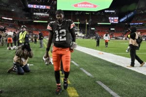 CLEVELAND, OHIO - NOVEMBER 16: Shedeur Sanders #12 of the Cleveland Browns walks off the field after losing to the Baltimore Ravens 23-16 at Huntington Bank Field on November 16, 2025 in Cleveland, Ohio.