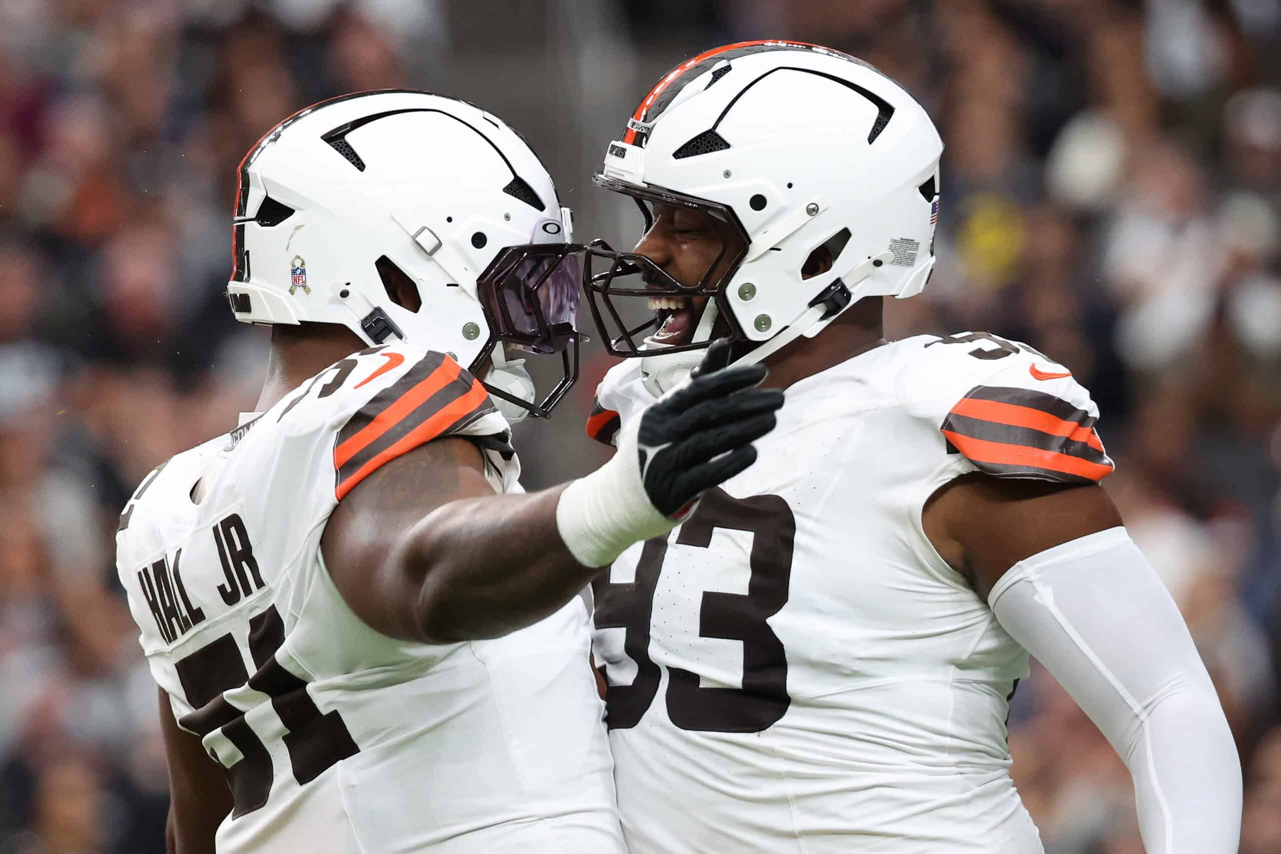 LAS VEGAS, NEVADA - NOVEMBER 23: Mike Hall Jr. #51 and Shelby Harris #93 of the Cleveland Browns celebrate a sack during the first quarter against the Las Vegas Raiders at Allegiant Stadium on November 23, 2025 in Las Vegas, Nevada.