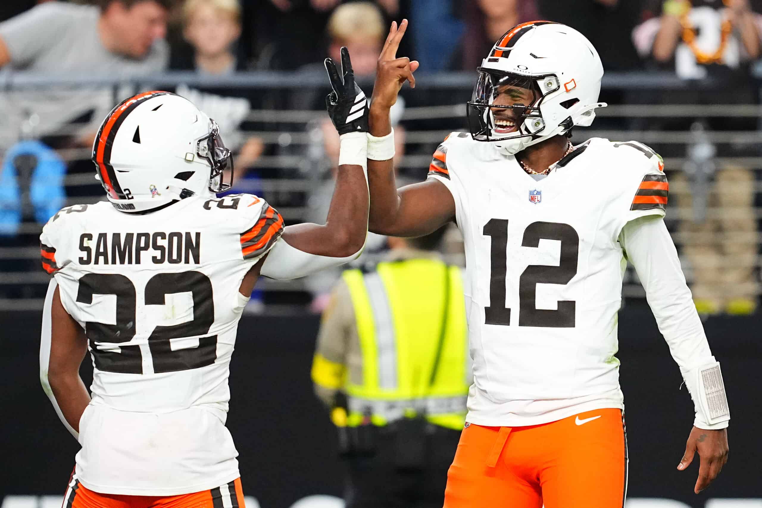 LAS VEGAS, NEVADA - NOVEMBER 23: Shedeur Sanders #12 and Dylan Sampson #22 of the Cleveland Browns react to a touchdown in the fourth quarter against the Las Vegas Raiders at Allegiant Stadium on November 23, 2025 in Las Vegas, Nevada.