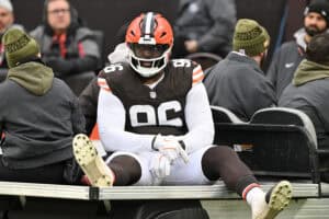 CLEVELAND, OHIO - NOVEMBER 30: Maliek Collins #96 of the Cleveland Browns is carted off of the field after being injured during the third quarter against the San Francisco 49ers at Huntington Bank Field on November 30, 2025 in Cleveland, Ohio.