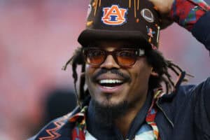 AUBURN, ALABAMA - OCTOBER 11: Former Auburn Tigers quarterback Cam Newton looks on during pregame warmups prior to the game between the Auburn Tigers and the Georgia Bulldogs at Jordan-Hare Stadium on October 11, 2025 in Auburn, Alabama.
