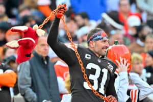 CLEVELAND, OHIO - NOVEMBER 05: A Cleveland Browns fan celebrates a play during the second half of the game against the Arizona Cardinals at Cleveland Browns Stadium on November 05, 2023 in Cleveland, Ohio.