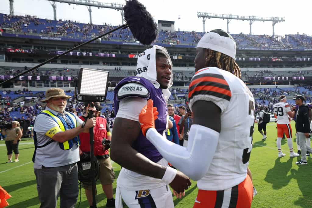 BALTIMORE, MARYLAND - SEPTEMBER 14: Lamar Jackson #8 of the Baltimore Ravens and Jerry Jeudy #3 of the Cleveland Browns meet after the game at M&T Bank Stadium on September 14, 2025 in Baltimore, Maryland.
