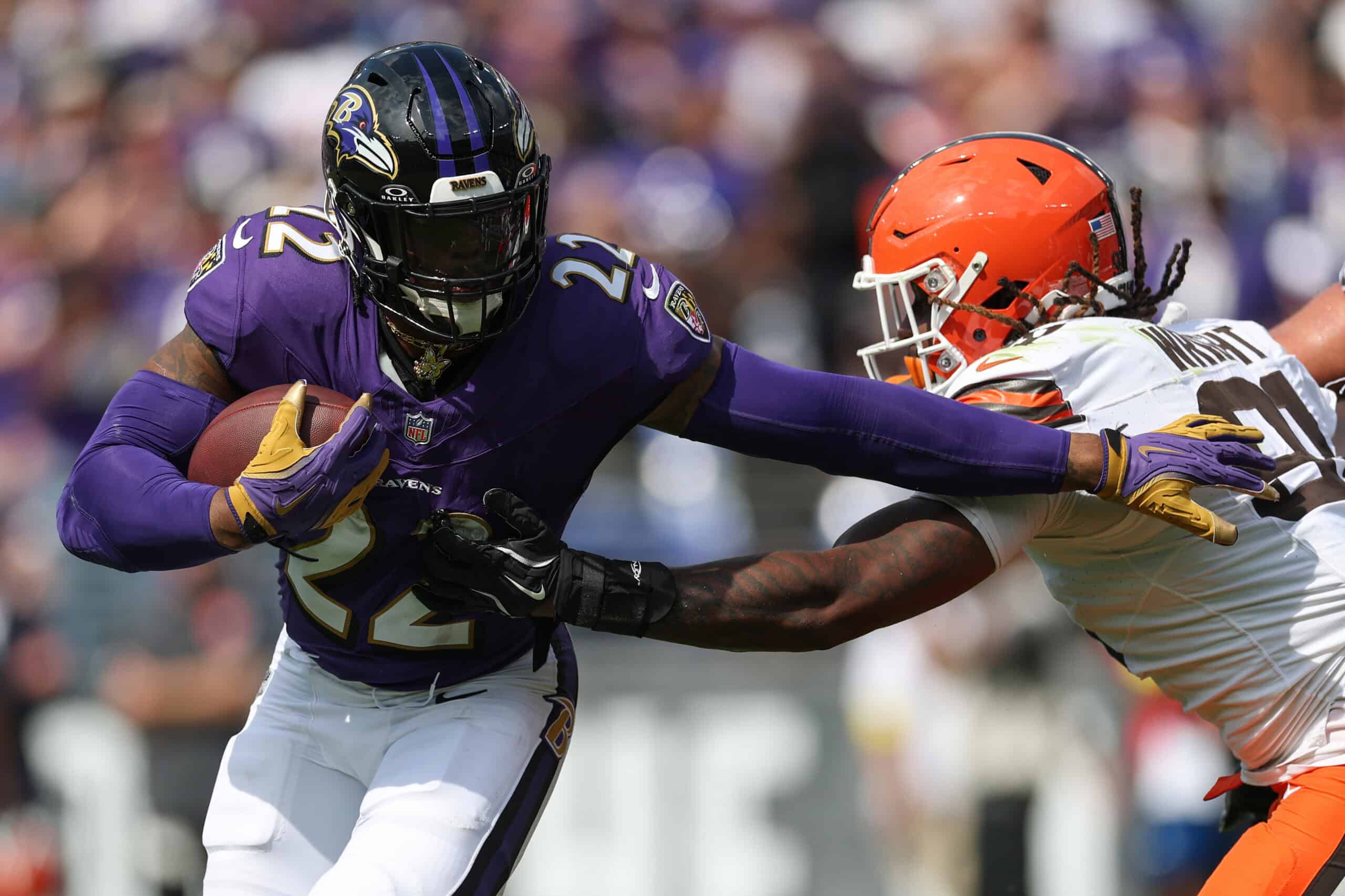 BALTIMORE, MARYLAND - SEPTEMBER 14: Alex Wright #91 of the Cleveland Browns tackles Derrick Henry #22 of the Baltimore Ravens during the third quarter at M&T Bank Stadium on September 14, 2025 in Baltimore, Maryland.