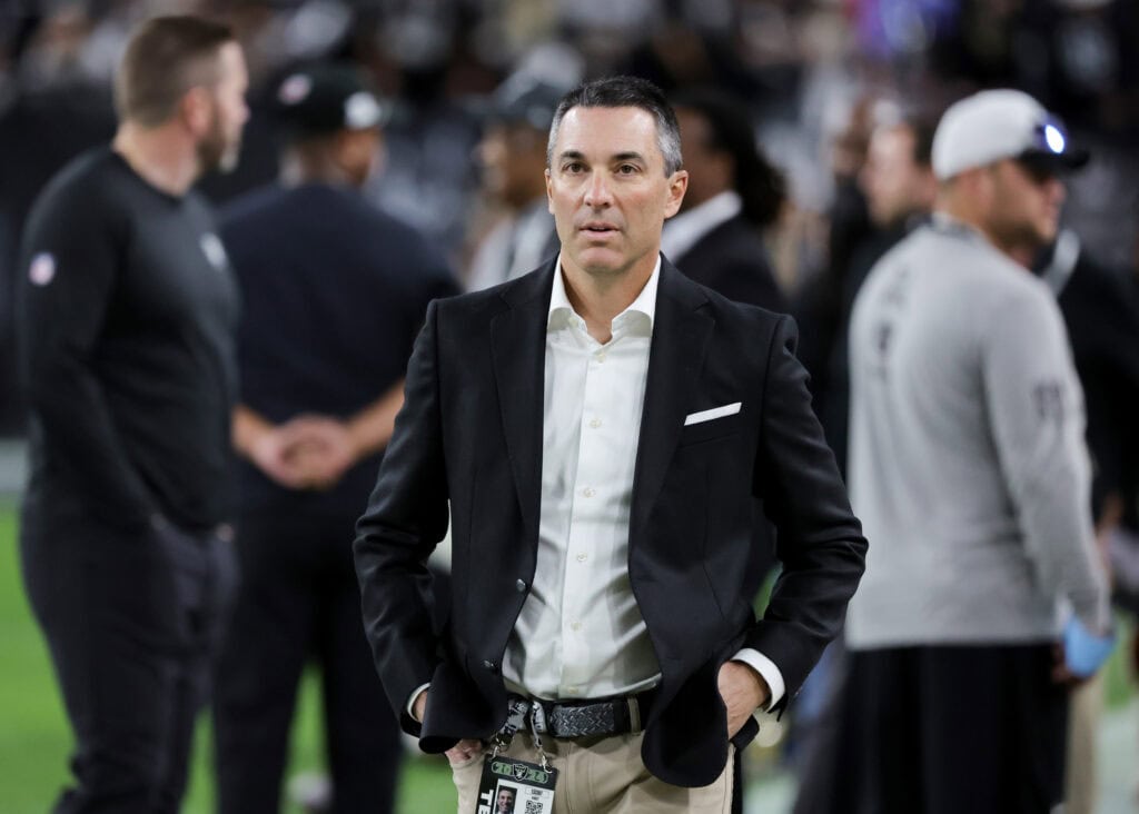 LAS VEGAS, NEVADA - DECEMBER 16: General manager Tom Telesco of the Las Vegas Raiders walks on the field before the team's game against the Atlanta Falcons at Allegiant Stadium on December 16, 2024 in Las Vegas, Nevada. The Falcons defeated the Raiders 15-9.