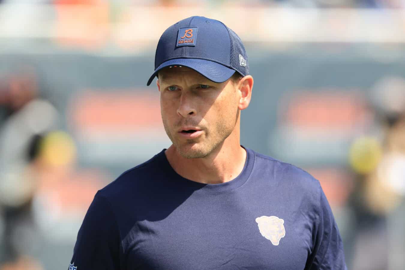 CHICAGO, ILLINOIS - AUGUST 10: Head coach Ben Johnson of the Chicago Bears walks onto the field prior to the game against the Miami Dolphins during the NFL Preseason 2025 game at Soldier Field on August 10, 2025 in Chicago, Illinois.
